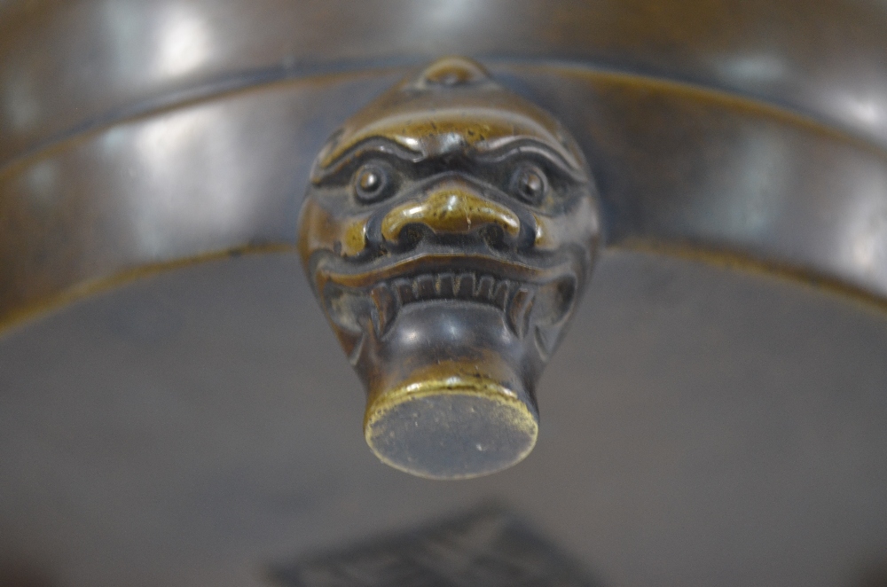 A bronze incense burner of circular form with three feet designed as mythological animal heads, 14. - Image 3 of 5