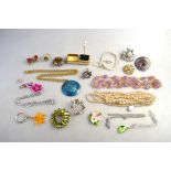 Collection of vintage and modern jewellery including paste set brooches, simulated pearls,