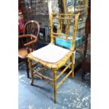 A Regency faux bamboo cane seated side chair