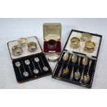 A cased set of six silver coffee spoons with bean finials, Sheffield 1931,