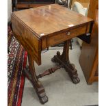 An early Victorian mahogany work table with drop leaves,