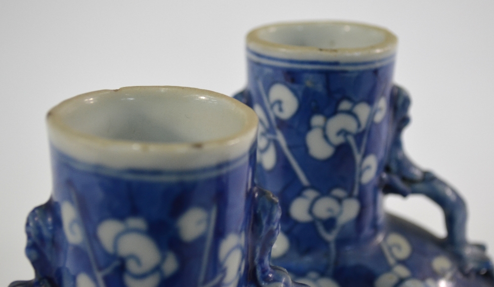 A pair of blue and white pilgrim flasks, each one decorated with a design of prunus in flower; 21. - Image 5 of 5