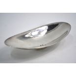 A post-war design hammered silver oval pin-dish on small raised foot, John Grenville, London 1960,