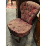 A Victorian buttoned spoon back upholstered nursing chair,