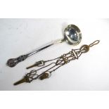 An epns chatelaine with equine theme, modelled with horseshoe, bit and other motifs,