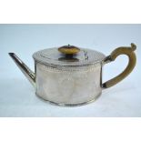 A George III silver bachelor teapot of eliptical form, with nail-engraved decoration, Thomas Daniel,