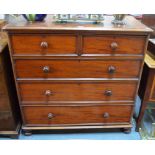 A 19th century mahogany chest of two short over three long graduated drawers on bun feet,