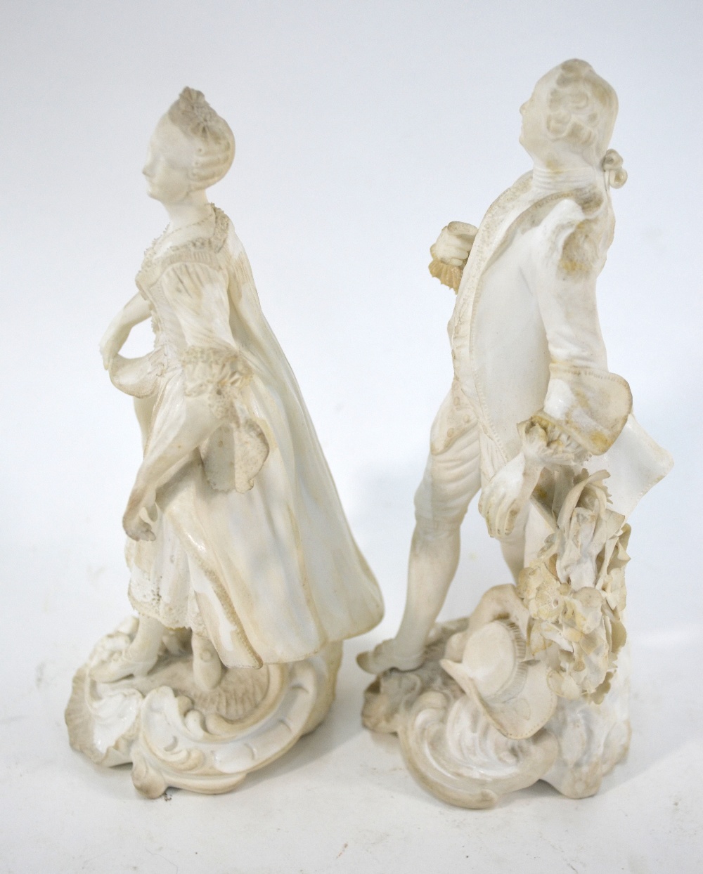 A pair of 18th century Derby biscuit figures of dancers on scrolling rococo bases, incised no. - Image 4 of 10