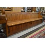 A pitch pine pew,