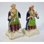 Two 19th century Staffordshire figures of Ottoman Turks - the lady playing a musical instrument, 15.