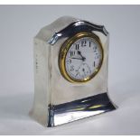 A silver-cased boudoir clock with Swiss