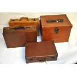 A vintage leather suitcase, a later leather suitcase,