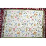 An Aubusson style needlepoint rug, the floral lattice design on pale yellow ground,