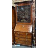 A George III mahogany bureau bookcase,