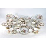 A Dresden coffee service, traditional floral and gilt decoration, comprising: Twelve coffee cups,