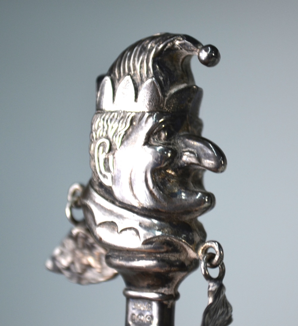 A 'Mr. Punch' silver baby's rattle with mother-of-pearl handle, W H Collins & Co. - Image 2 of 6