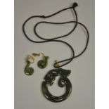 A New Zealand jade carved Tiki to/w a pair of similar earrings