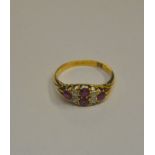 A ruby and diamond boat shaped cluster ring,