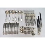 A US Sterling part set of flatware and cutlery, comprising ten dessert forks; ten knives,