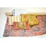 A pale terracotta chenille throw with Persian influenced design in red/green,