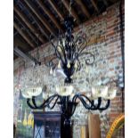A large Italian Murano glass electrolier/chandelier executed in black and champagne coloured hand