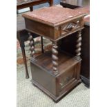 An antique French rouge marble top walnut cabinet