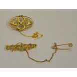 Two Edwardian gold brooches, one set with peridot and seed pearls,
