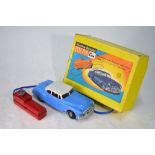 A boxed Marx Toys Battery Operated Electric Car - 'Forward and Reverse Movement with Remote