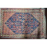 An antique Persian Ferahan rug,