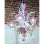 A highly ornate Murano iridescent pink glass five-branch electrolier with foliate embellishments,