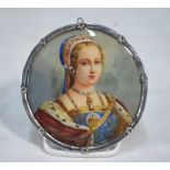 A circular miniature portrait on ivory of a Tudor noblewoman, unsigned, 6.