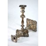 An Edwardian pair of loaded silver baluster candlesticks in the Georgian manner,