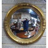 A Victorian gilt framed convex mirror,