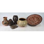 Two African painted terracotta bowls and a similar jar with geometric decoration,