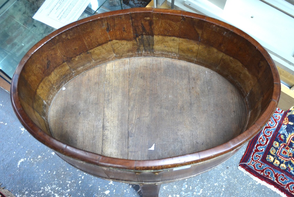 A brass bound coopered mahogany planter of ovoid form, raised on four through-staves, - Image 2 of 2