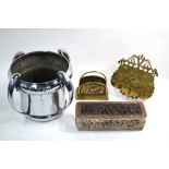 An Art Nouveau electroplated cache-pot with four whiplash handles and stylised floral embossing,