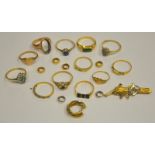 A collection of twelve various yellow metal rings, bar brooch with applied horse motif,