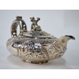 A George IV bachelor teapot of compressed melon form with Chinese Mandarin figural finial and