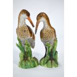 A pair of 19th century Berlin porcelain models of snipe, underglaze blue factory mark to base, 19.