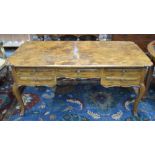 A French walnut bureau plat,