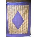 A vintage purple bed quilt with pink/purple and ivory paisley border with reversed pattern on other