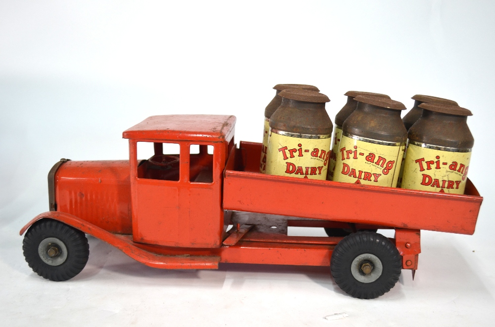 A large Tri-ang Dairy tinplate model Bedford Tipping Truck, c/w six churns, - Image 5 of 9