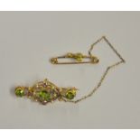 Of Suffragette interest - An Edwardian open style brooch set with peridot,