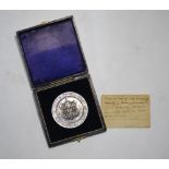 Winchester interest: a scarce unmarked white metal commemorative medallion, 1,