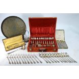 A French cased set of four Art Nouveau gilt metal serving spoons and fork with 800 grade handles,