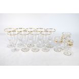 Nine French cocktail glasses, conical bowl with gilded rim, cut stem, flat foot with gilded edge,