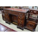 A 19th century and later Chippendale style mahogany kneehole desk,