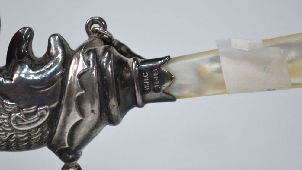 A 'Mr. Punch' silver baby's rattle with mother-of-pearl handle, W H Collins & Co. - Image 3 of 6