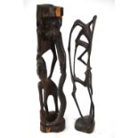 Two West African tribal carvings of contorted figures,