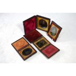 Four Ambrotypes, all cased; three of women,